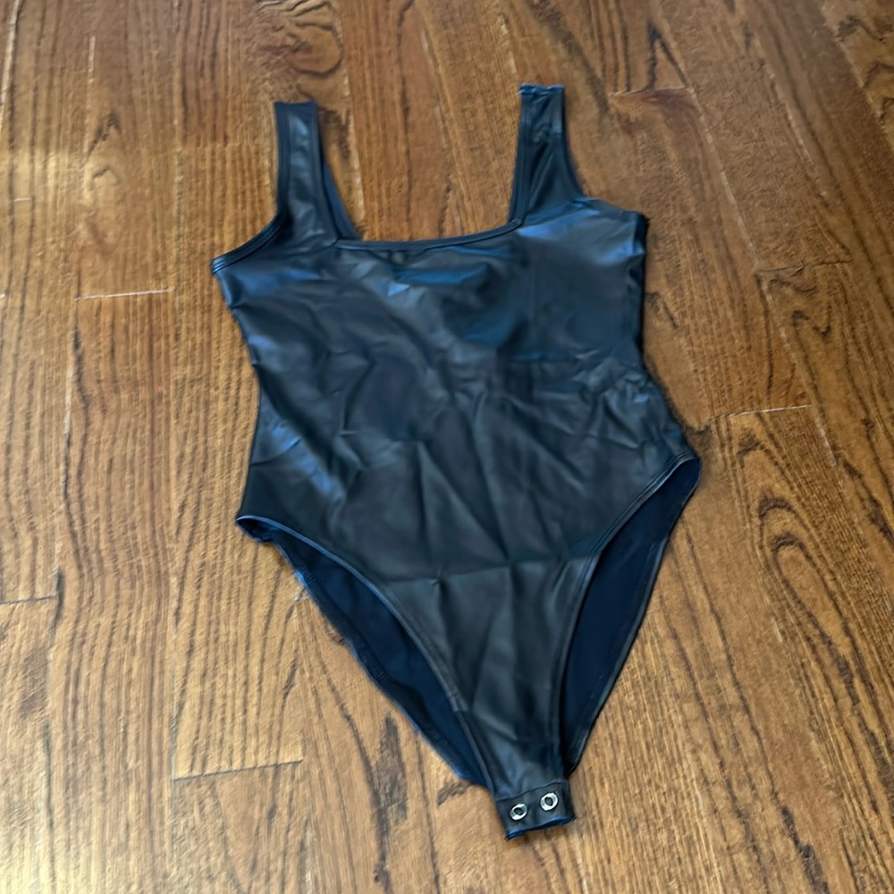 Black Pleather Bodysuit . Brand New size Medium